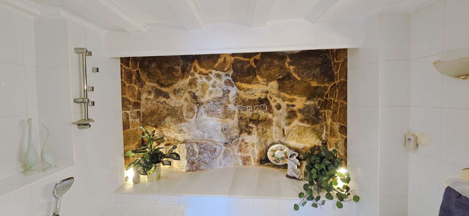 This charming town house oﬀers several unique features that are rarely found in traditional village properties.