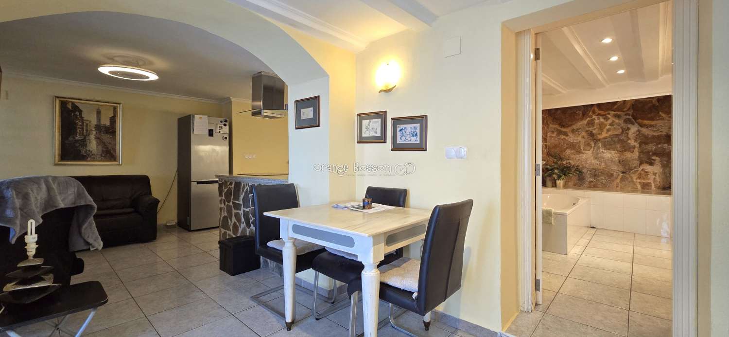 This charming town house oﬀers several unique features that are rarely found in traditional village properties.